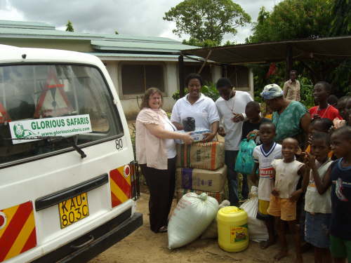 Lynn handing over some of the food stuff